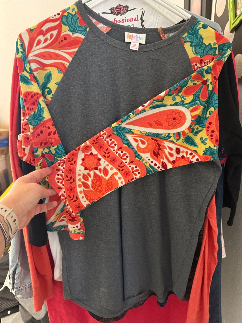LuLaRoe Dark Gray Raglan Top with Coral Teal Floral Sleeves